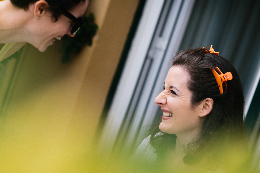 bride and her best friend during getting ready destination wedding italy