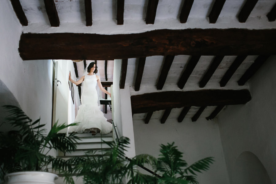 bride getting ready dress wedding photographer in italy