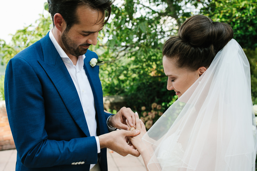 gianni putting the ring on jessica’s finger