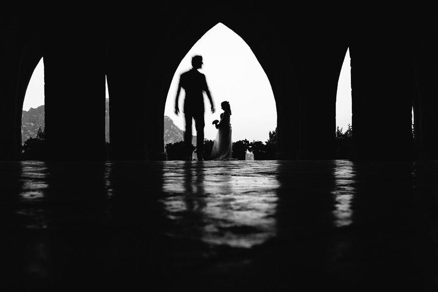 wedding portrait under the arcades at villa cimbrone