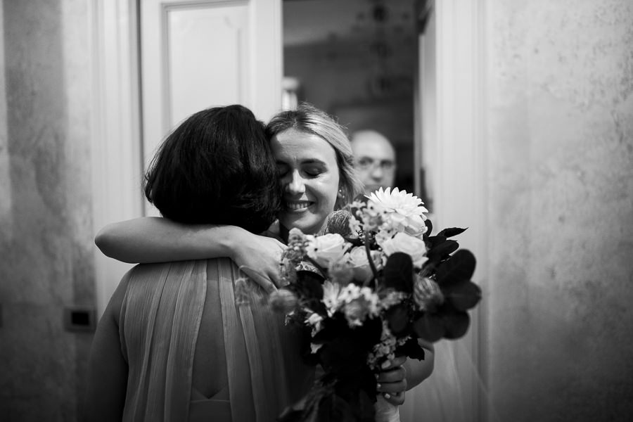 bride getting ready for wedding on lake como