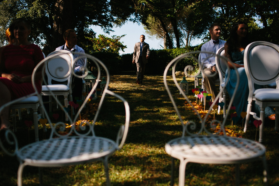 groom entering wedding ceremony venue