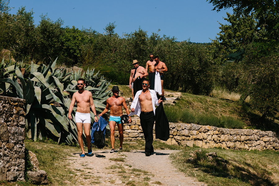 Groom and best man getting ready For wedding in Tuscany