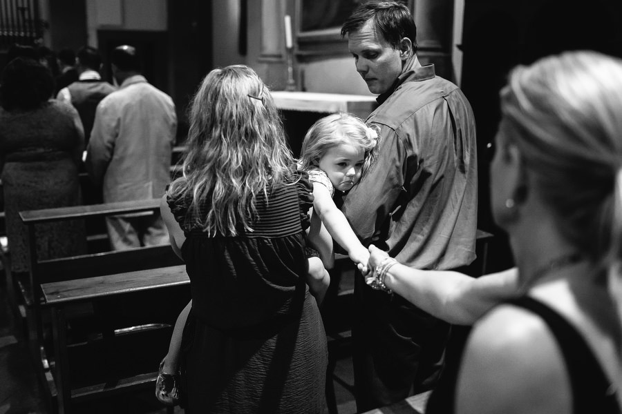 little girl crying with tears during wedding ceremony in florenc