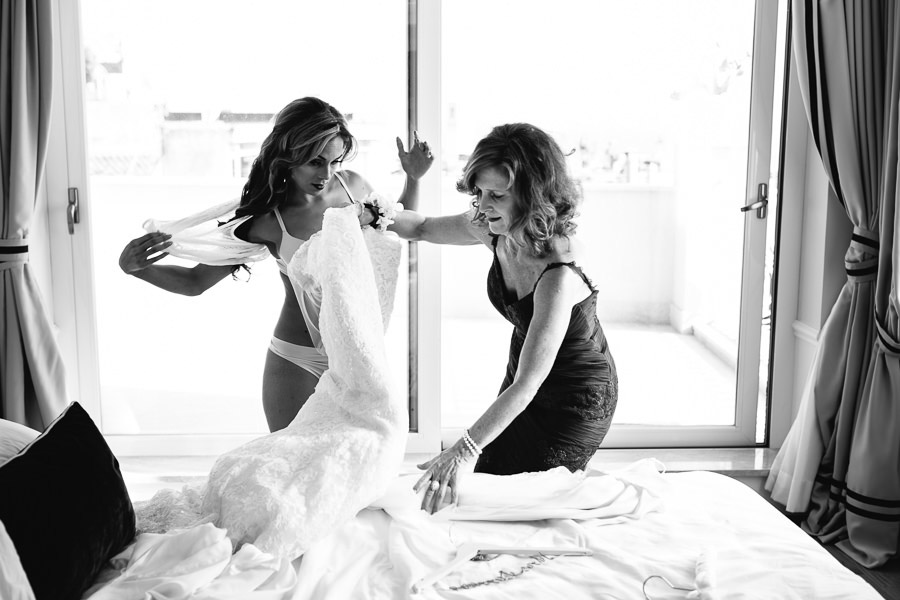 Bride putting her wedding dress in sicily