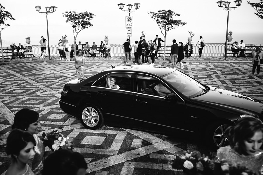 drive arriving by car for wedding ceremony at Castelmola Castle