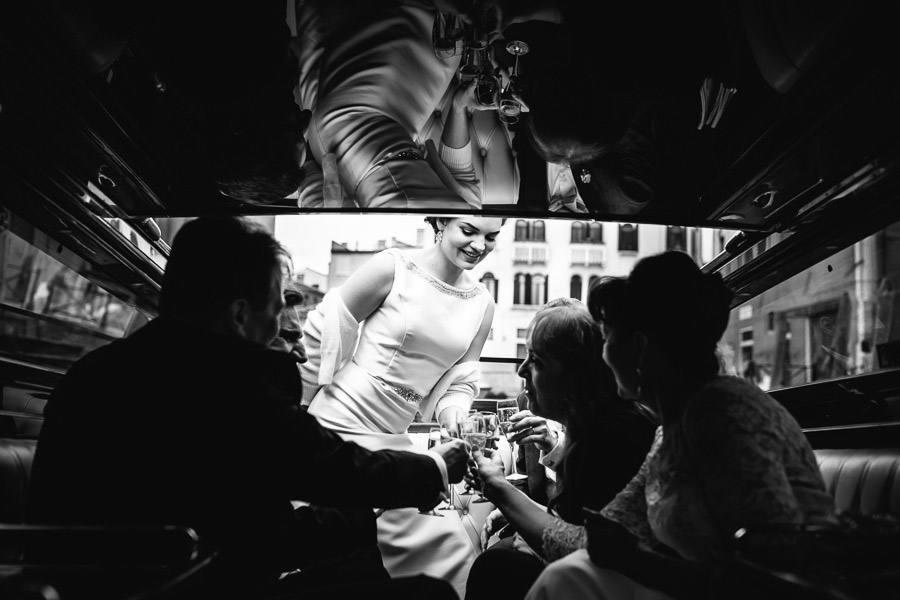 Bride Having a glass of champagne in Venice