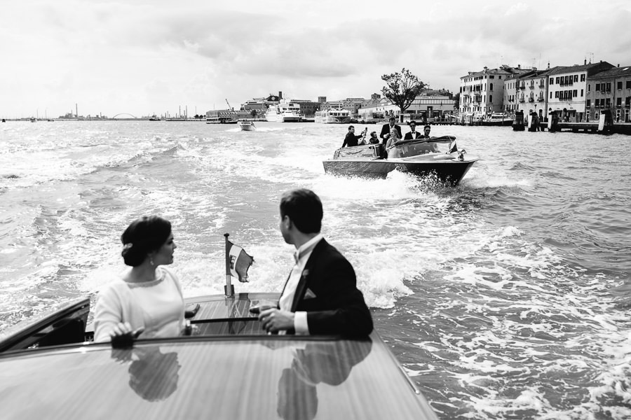 Bride and groom with their wedding guests in Venice