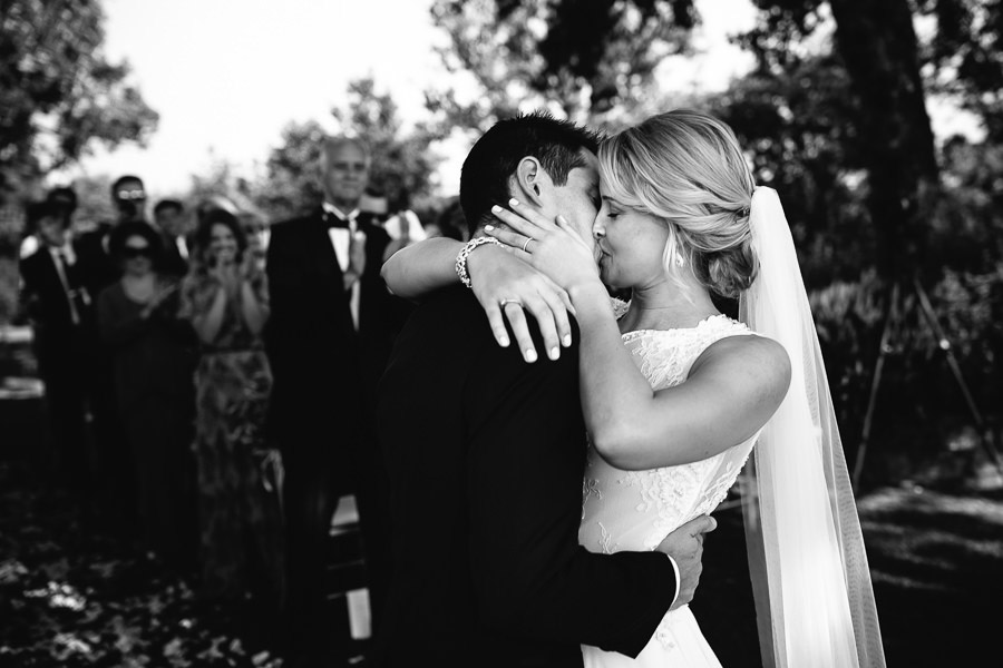 castello di meleto wedding bride and groom kiss