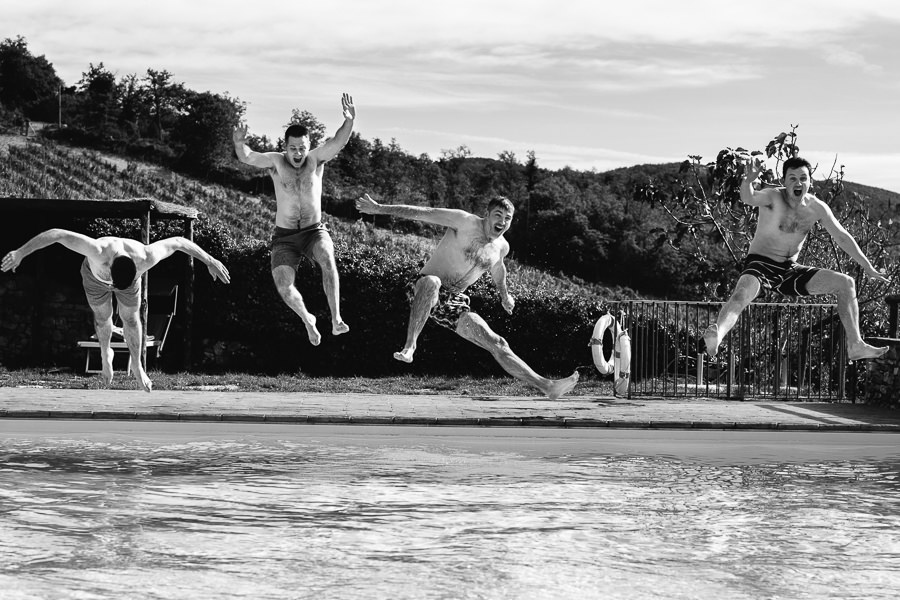 tuscany wedding boys in the pool