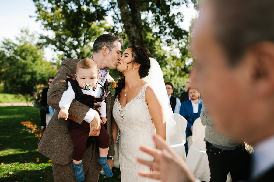 groom kissing bride