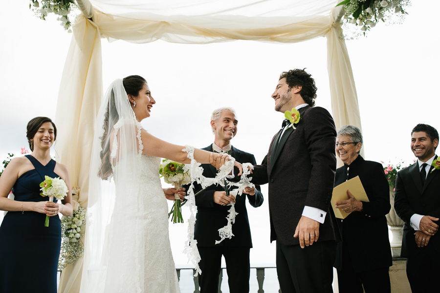 bride and groom tying the knot in portofino