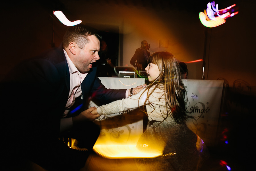 father dancing with his daughter