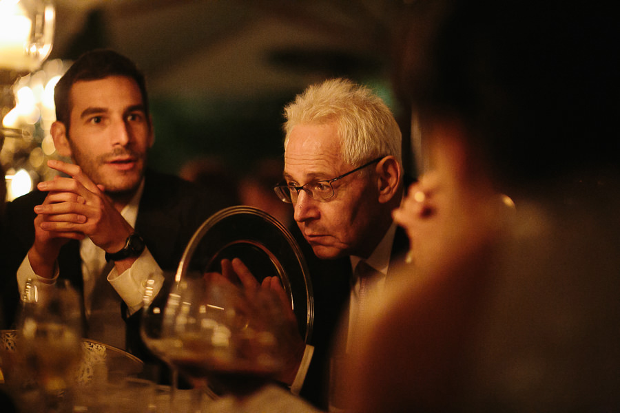 guests chatting during wedding reception at la cervara