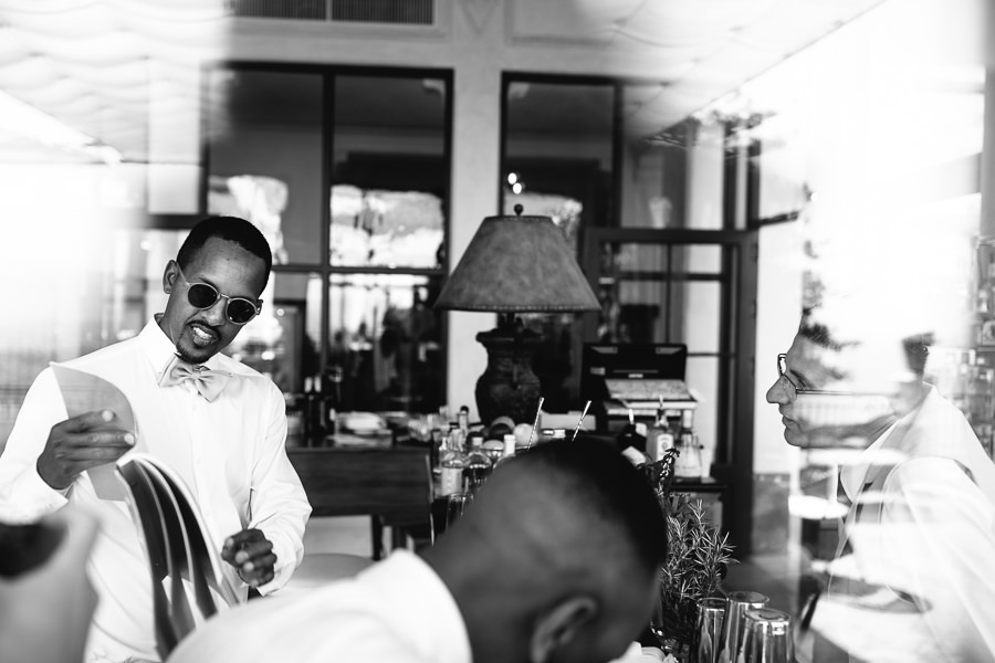 groom having a drink before wedding