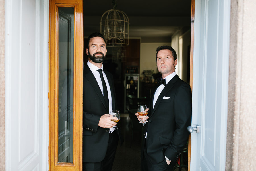 Groom having a drink at Hotel Villa Aurora Lezzeno Lake Como