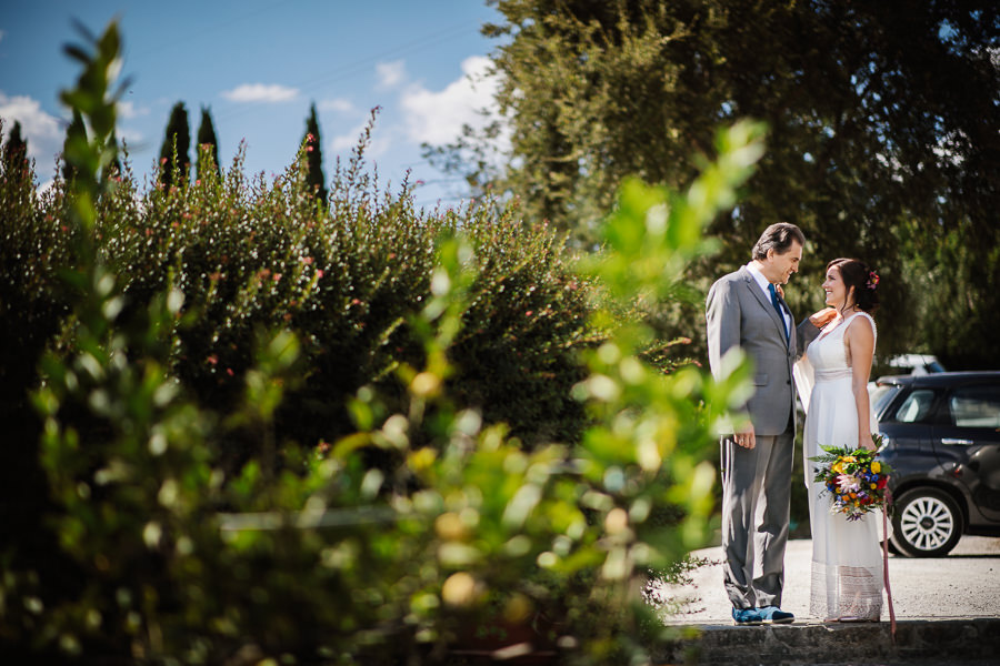 bride walking down the aisle in tuscany