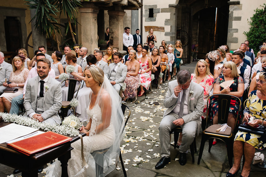 bride and groom wedding ceremony castello del trebbio