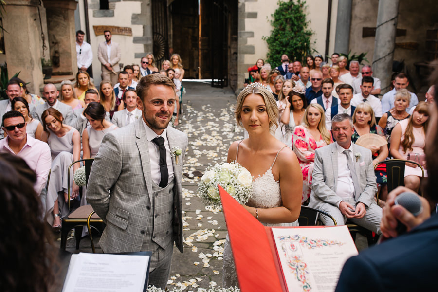 bride and groom wedding ceremony castello del trebbio