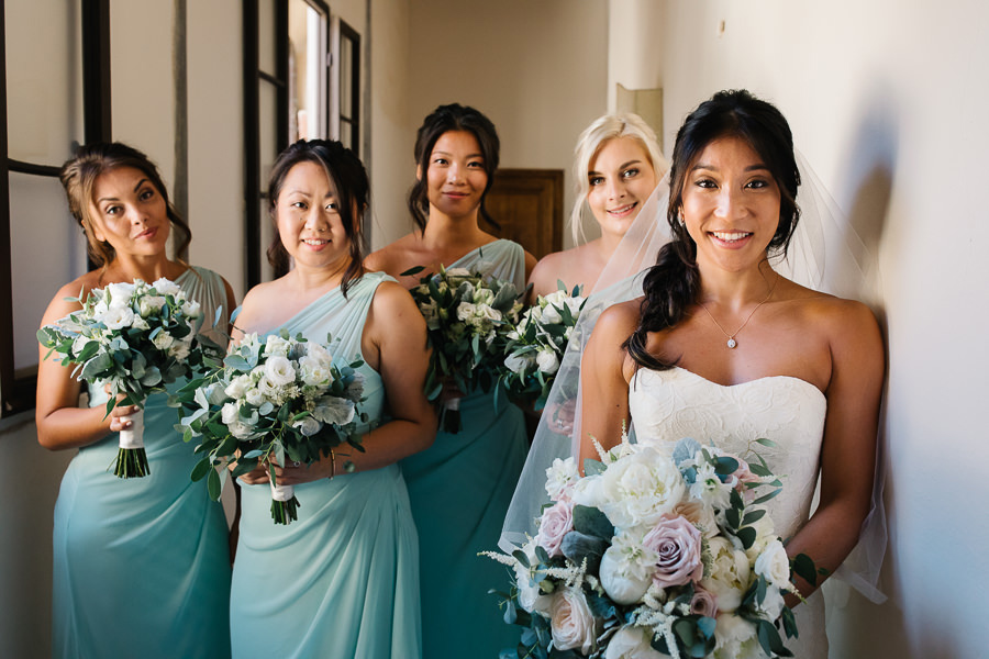 portrait photo of bride and her bridesmaids